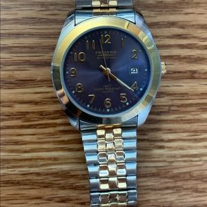 Prestige silver and gold watch.